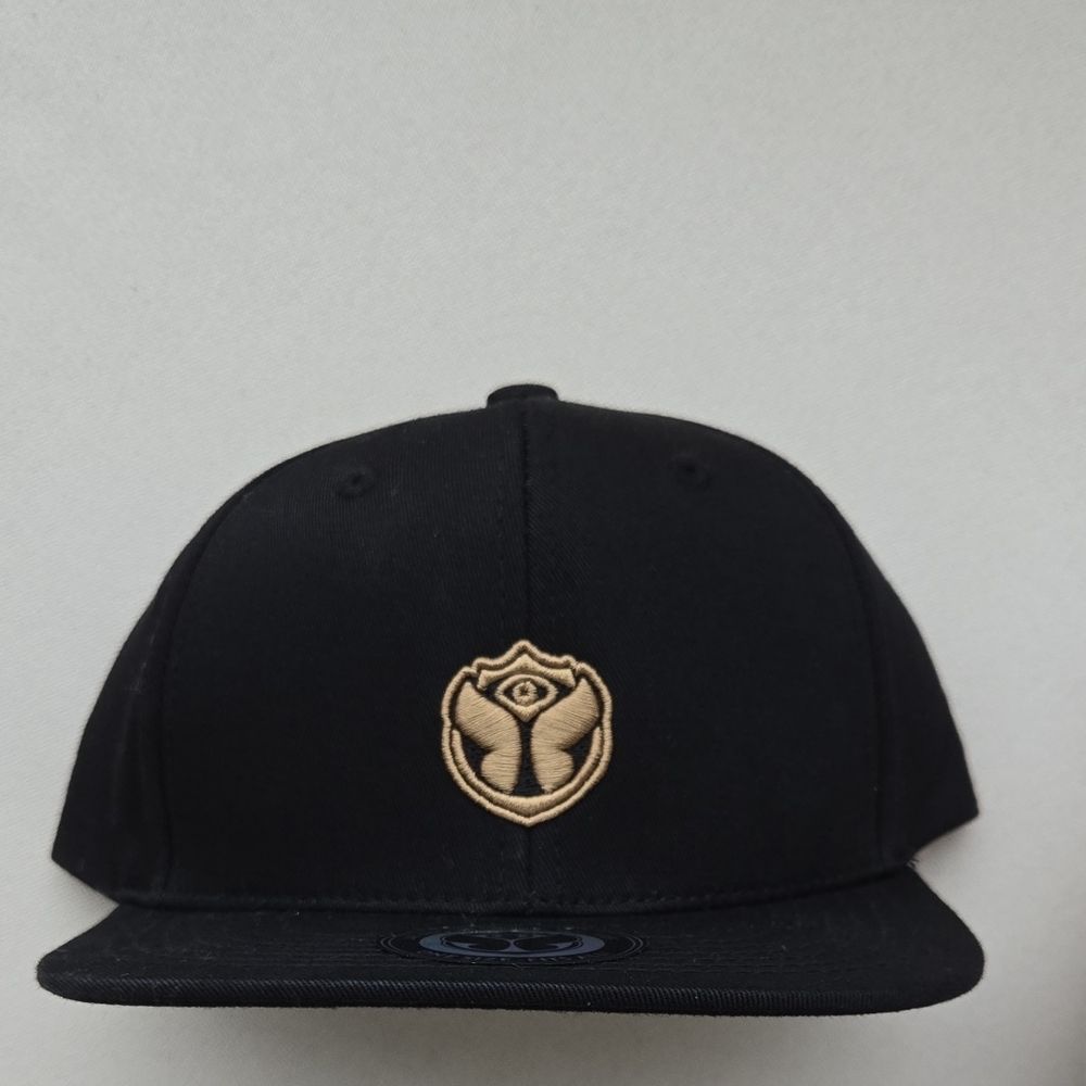 Black Snapback Hat with Gold Tomorrowland Logo